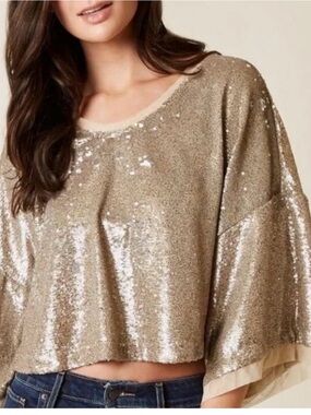 Free People champagne dreams, gold sequin top. Size small.